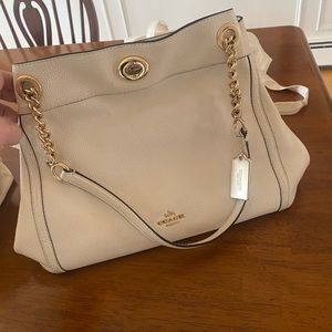Beige Coach purse.  Great condition, gently used.